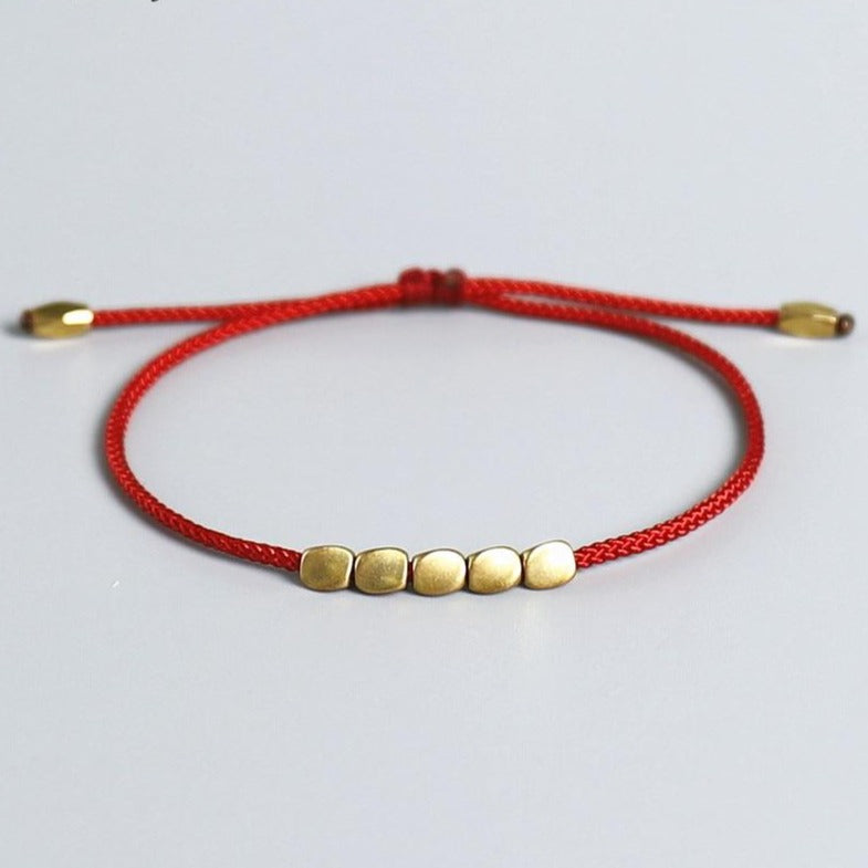 Bracelet Tibétain Tressé Avec Perles De Cuivre