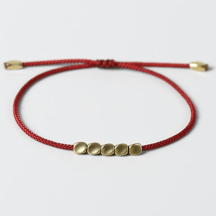 Bracelet Tibétain Tressé Avec Perles De Cuivre