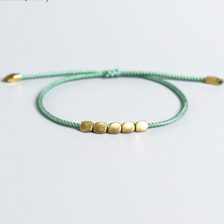 Bracelet Tibétain Tressé Avec Perles De Cuivre