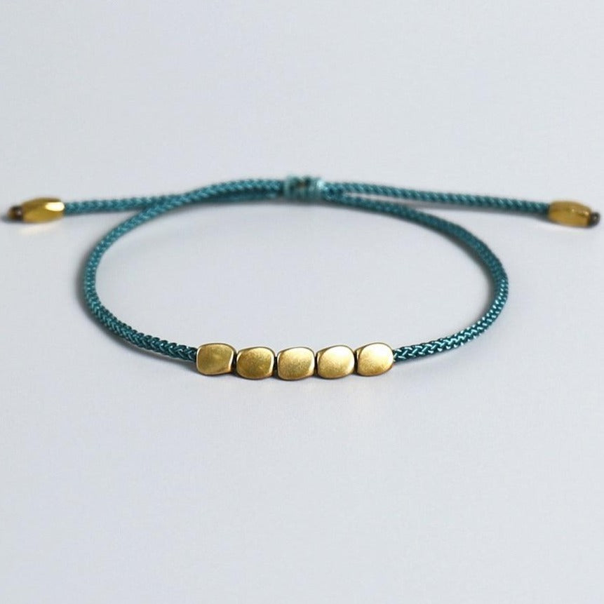 Bracelet Tibétain Tressé Avec Perles De Cuivre